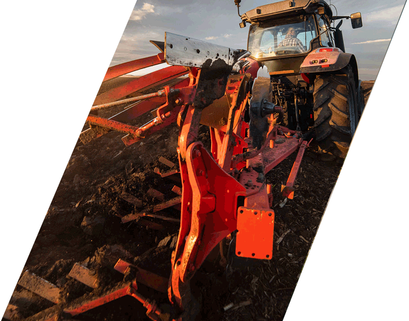 Tractor with plough